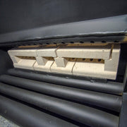 GEMA Shop Festbrennstoffkessel ROJEK KTP 40 Innenansicht mit Keramikelementen und schwarzen Metallrohren